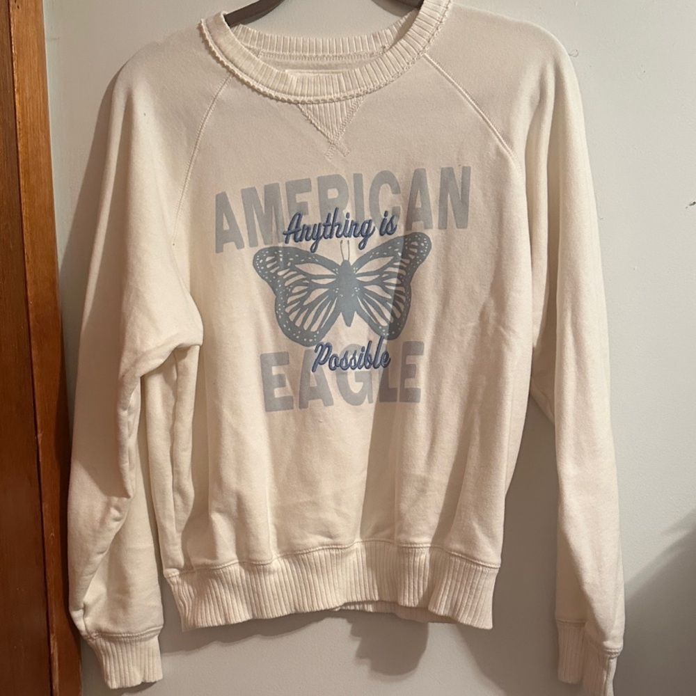 American Eagle Outfitters White Sweater with Blue Butterfly Graphic